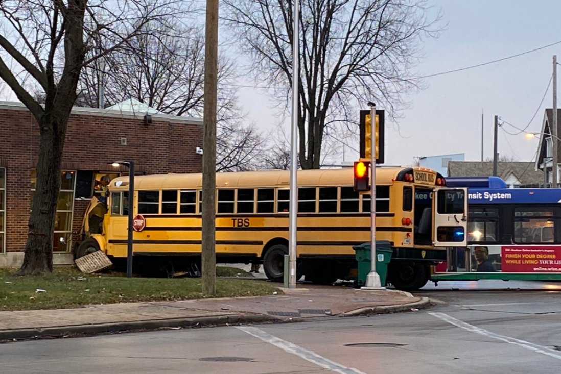 School bus crashes into library